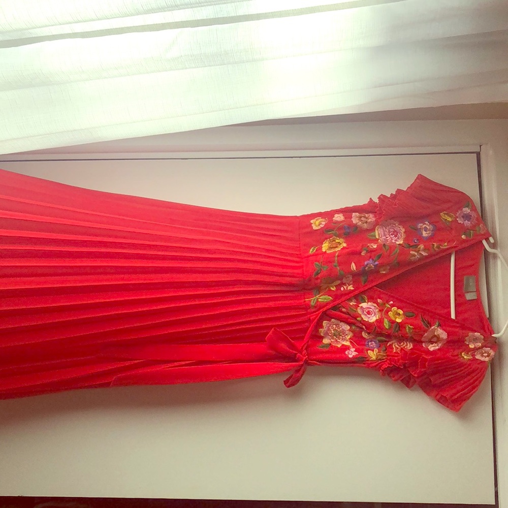 A new maxi dress with flower embroidered